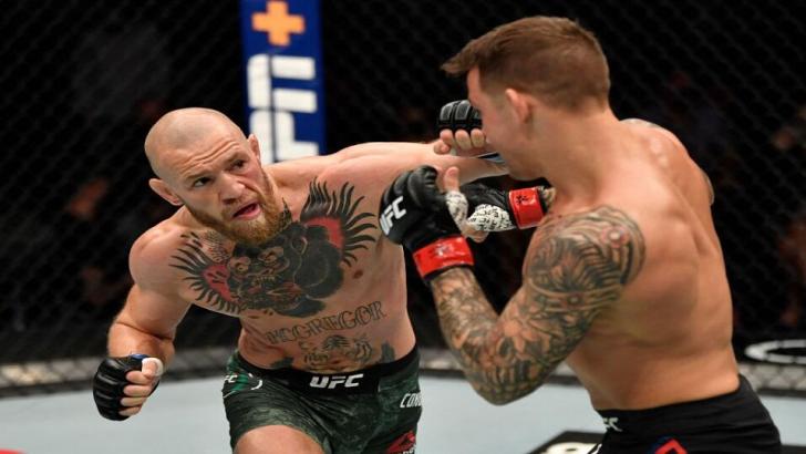UFC's Conor McGregor and Dustin Poirier in the ring